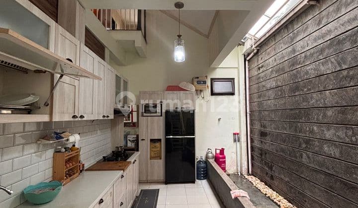 Rumah 2 Unit di Lahan Luas 663m² Duren Sawit - SHM, Lebar Muka 30m, Jalan Lebar