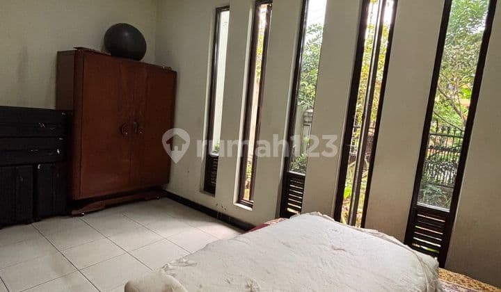 Rumah 2 Unit di Lahan Luas 663m² Duren Sawit - SHM, Lebar Muka 30m, Jalan Lebar