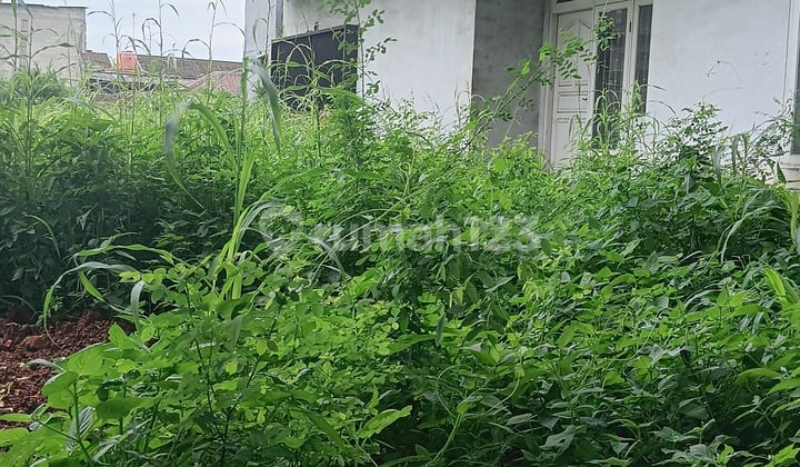 Cheap Sale Land and Building Attached.puri West Jakarta