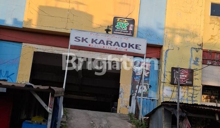 TANAH DAN GEDUNG DIJUAL LOKASI DIPINGGIR JALAN BESAR