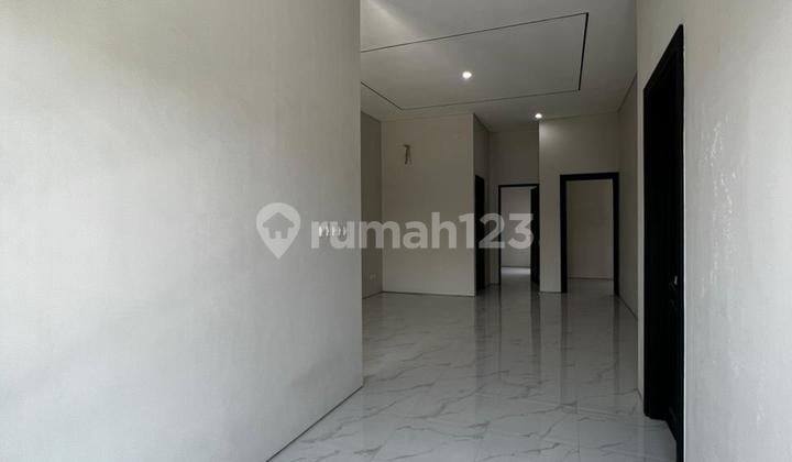 Translated to English:
"For Sale: 2-Story New Ready-to-Occupy House in Pondok Mutiara Regency, Sidoarjo City"