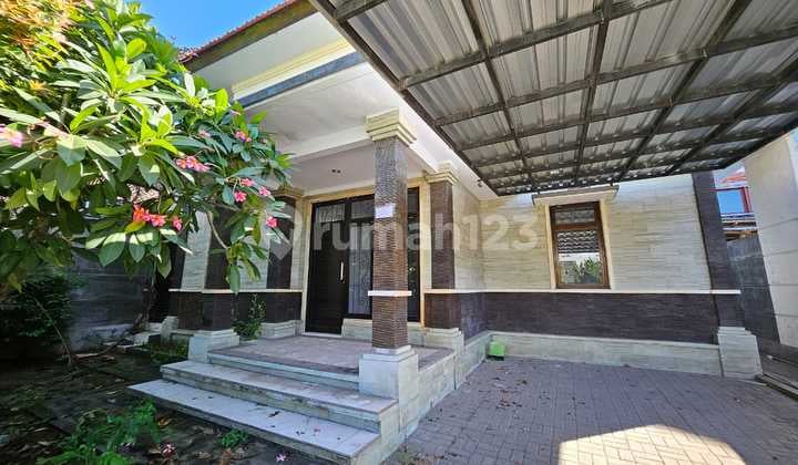 Unfurnished house with 4 bedrooms, 3 bathrooms, plus carport and wide access road, located in Kori Nuansa Jimbaran.