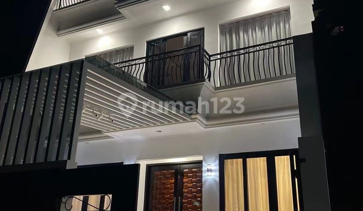 For sale: 3-story modern minimalist house in Istana Family Kuta housing complex.