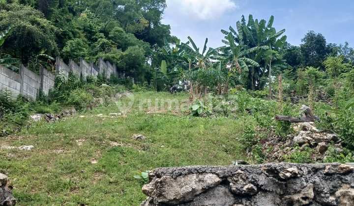 Land on the Main Roadside of Balangan Beach with Sea and Airport View
