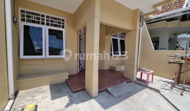 Rumah Renovasi Luas 120 M2 di Bougenville Graha Raya