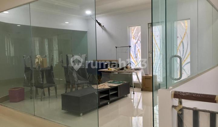 Modern Minimalist House in Puri Media, prime location near Puri Indah Mall & Lippo Mall Puri.