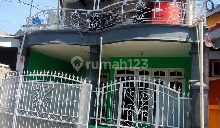 Rumah SHM 2 LT di THB dengan Desain Modern dan Rooftop 22199 LI