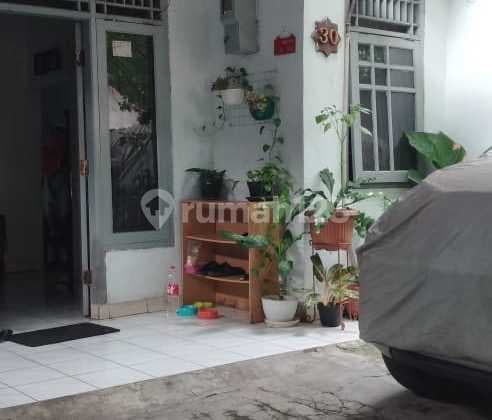 Rumah di Flamboyan, Rempoa