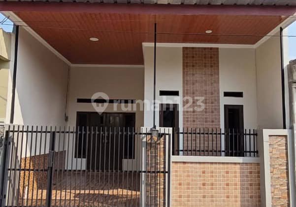 Fully Renovated House with 3 Bedrooms, Eligible for KPR at Sector V Pondok Ungu Permai, Bekasi.