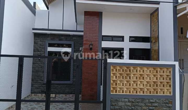 Rumah Praktis dan Siap Huni di Pesona Anggrek, Lingkungan Nyaman (73619 Ds)