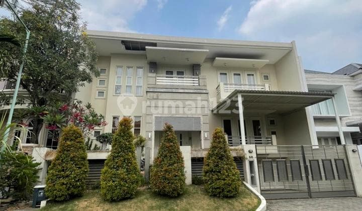 Rumah mediteran mewah siap huni graha family blok O 11M nego