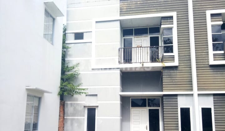 For sale 2-story house on Jl. Abadi Soekarno Hatta, Pekanbaru.