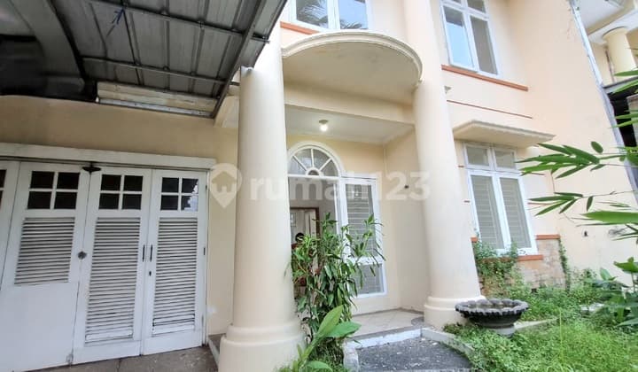 Two-story house located on a main street in Melati Mas, Serpong.