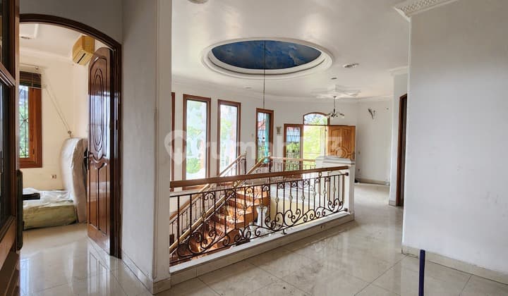 Puri Indah Corner House. Land 330 M2. Facing Park. 2 Floors. Wide Road.