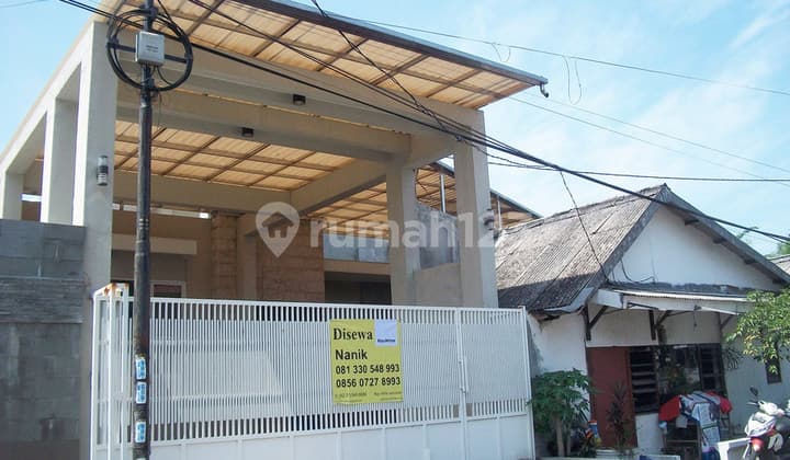 House in Kertomenanggal, South Surabaya, Good + Well-Maintained, Wide Road Row, Move-In Ready, Suitable for Residence / Office.