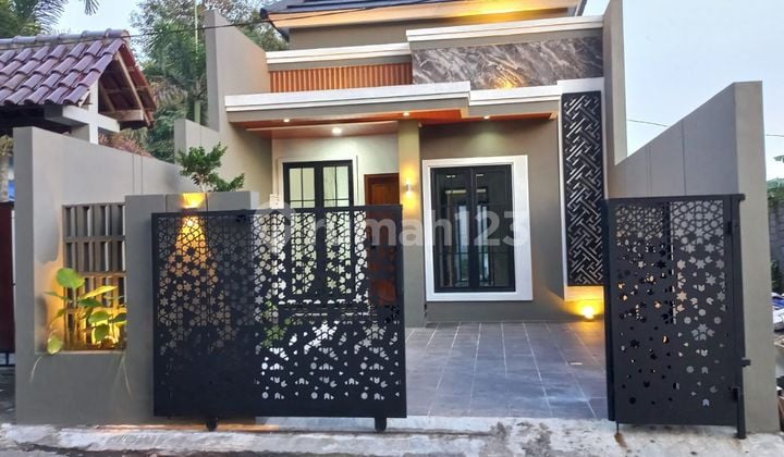 New House on Asphalt Road Near UII Campus