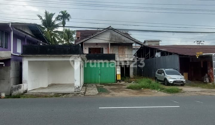Adisucipto Roadside Long Plot Shop House Plus Land