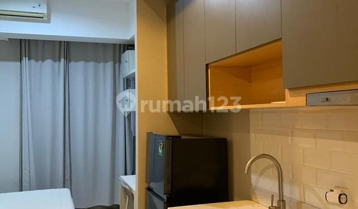 Dijual Studio Apartemen Taman Anggrek Full Furnish Lantai Sedang