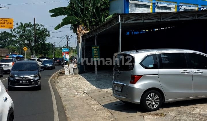 RUMAH SISI JALAN RAYA BAGUS UNTUK BISNIS. DEKAT KANTOR WALIKOTA TANGSEL. PARKIR 40+ MOBIL. MURAH