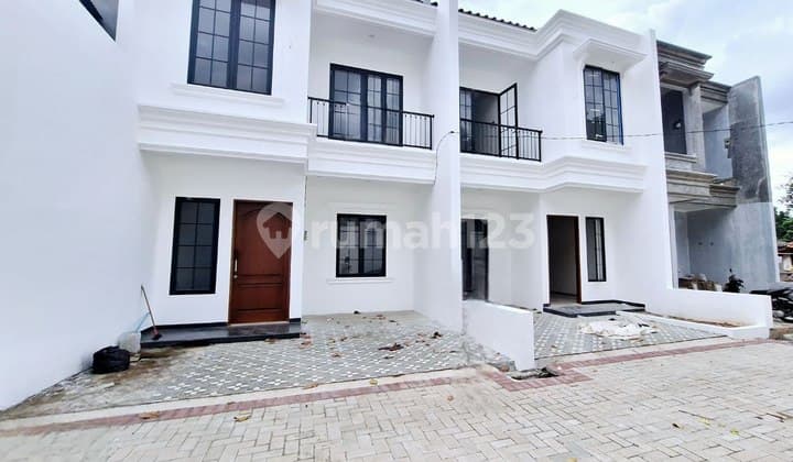 Rumah Cluster Mewah Design American Clasic Strategis di Jatiwarna