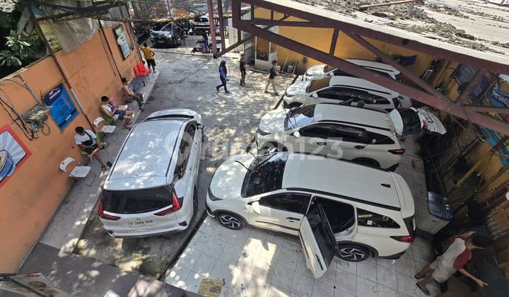 For Sale: Land with Active Carwash Business by Tubagus Angke Main Road. Minimum Net Income 75 Million/Month.