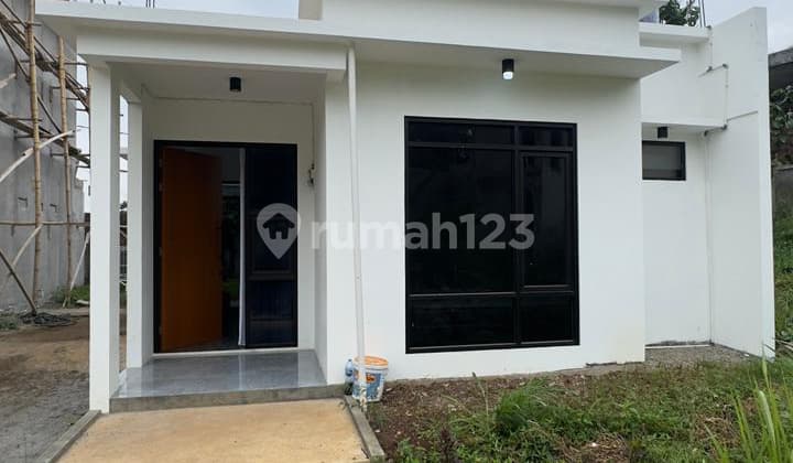 Land and New Building House for Sale in Cigadung