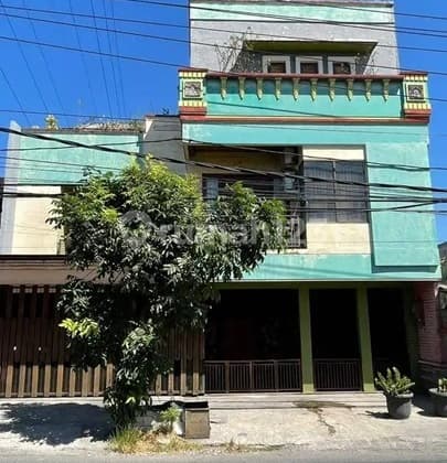 Rumah Pinggir Jalan di Raya Lontar