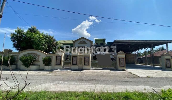 RUMAH DI PANAH HIJAU