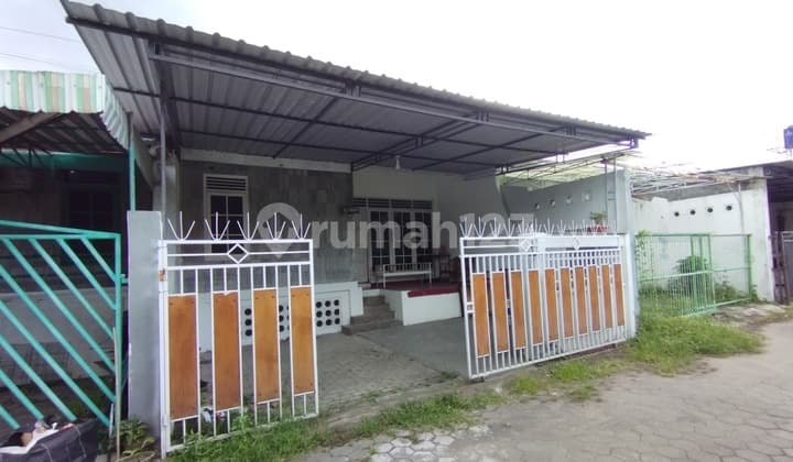 RUMAH DI DEKAT JL.KOL.SUGIYONO