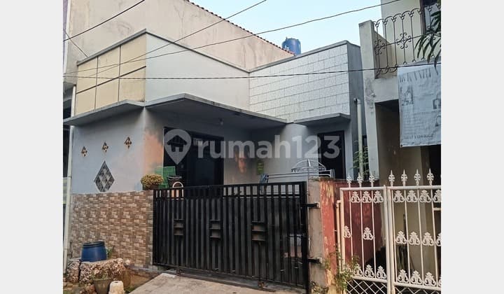 Rumah Bergaya Minimalis di Kelapa Dua