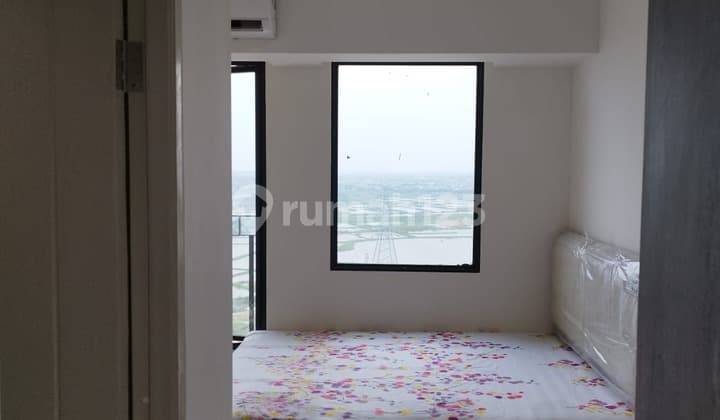 Disewakan Apartemen Osaka Riverview Pik 2 Studio Semi Furnished