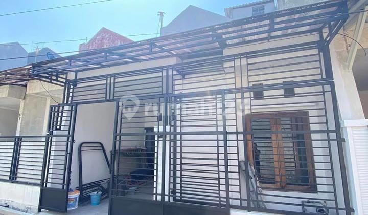 Rumah 1,5 Lantai Rangkah, Tambaksari Siap Huni
