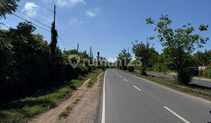 TRANSLATION: For Sale: Tourism Land on Main Road Sawangan - Suitable for Hotel & Resort
