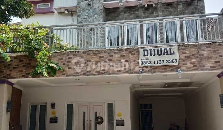 Perumahan Griya Lembah Depok, terdapat kolam renang di dalamnya