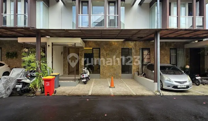 Well-Maintained Semi-Furnished House in a Townhouse Complex in Condet, East Jakarta