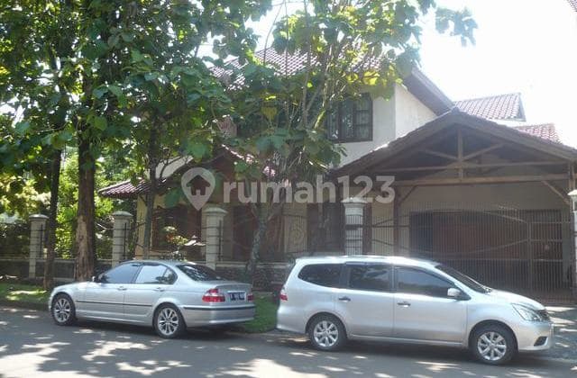 For quick sale, a tidy house in Puspita Loka, BSD City, strategically located near Taman Kota 1 and Al-Azhar School.