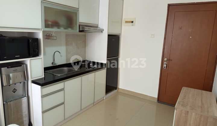 Here is the translation:
**Great Price! IPL Included, 2BR Fully Furnished at Royal Olive Residence.**