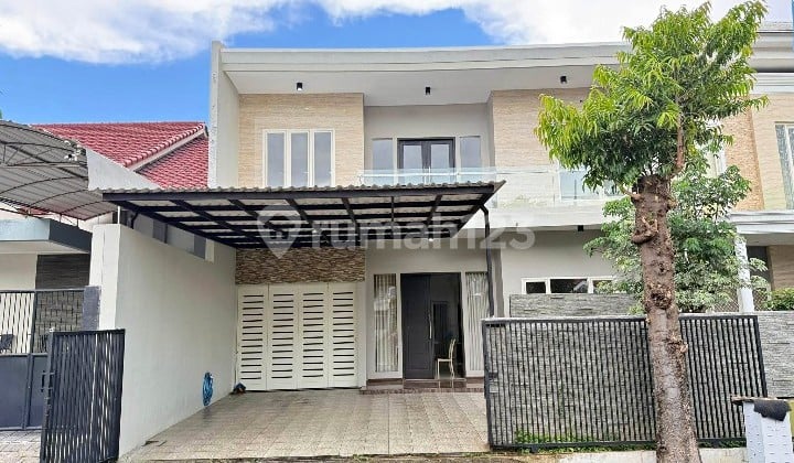 Rumah minimalis citraland utama international village luar cluster