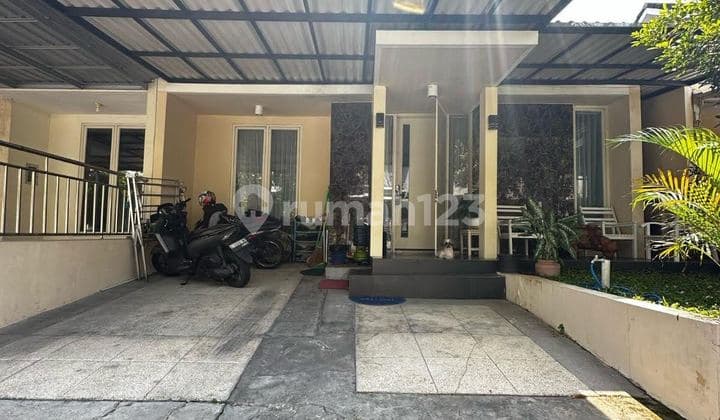Rumah Taman Puspa Raya Citraland Utama Baru Renov