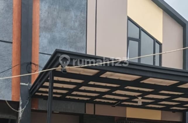 Rumah Dalam Cluster Akses Pinggir Jalan Raya