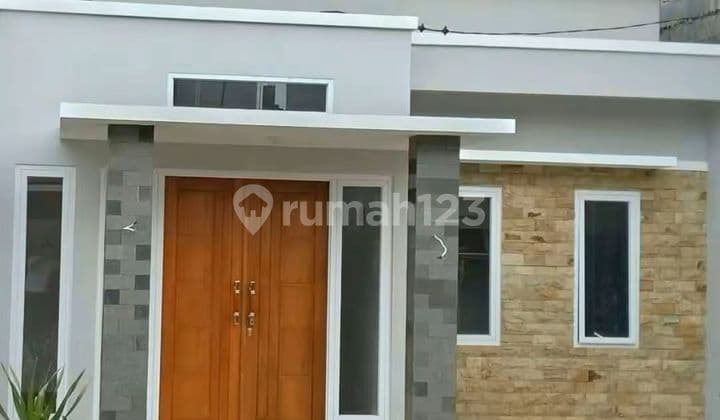 House in De'khirani Village Cluster, Depok, West Java