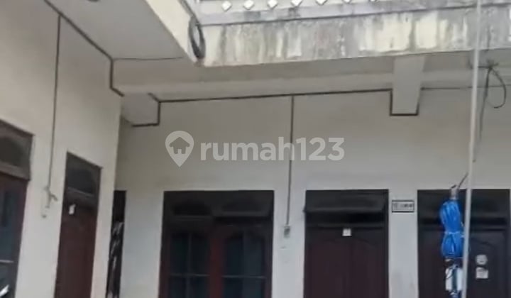 Text: Ready to Occupy Boarding House with 15 Rooms in Kuta Near Airport Bg/Jess