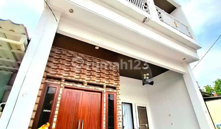 Rumah Minimalis 2 Lantai Lokasi di Graha Raya