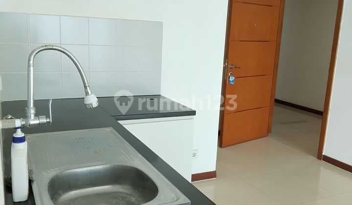 Condominium 2 Kamar Tidur Unfurnished Bagus