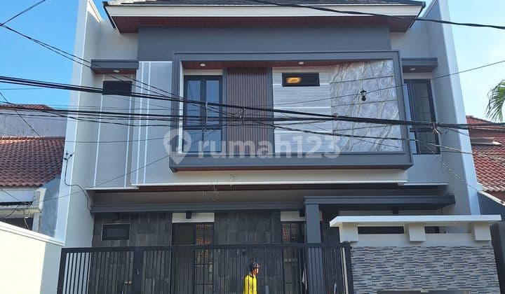 Rumah Manyar Tengah Kota Surabaya Lebar 10 Hadap Selatan SHM