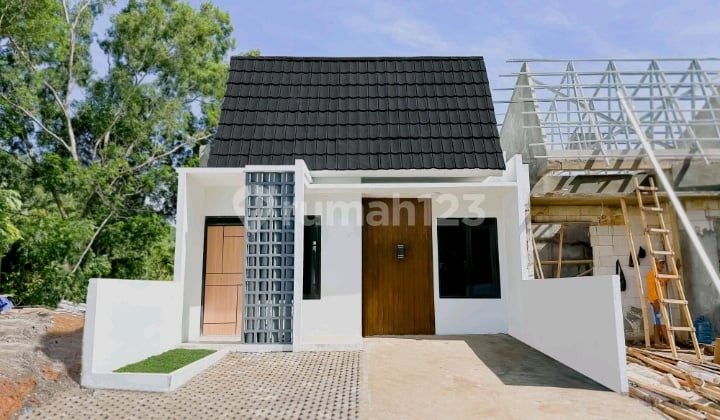 Rumah 1 Lantai Bergaya Minimalis Modern Dengan View Gunung