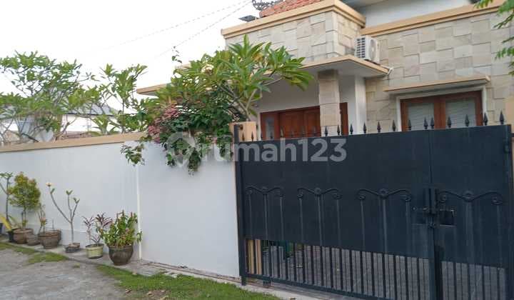 Beach House with Modern Villa-Style Facade