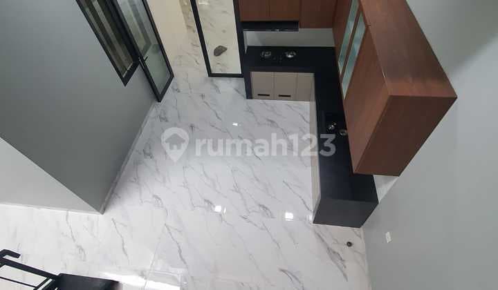 Rumah New Minimalis 2½Lt Full Granit Cantik Strategis Siap Huni - Griya Loka, BSD