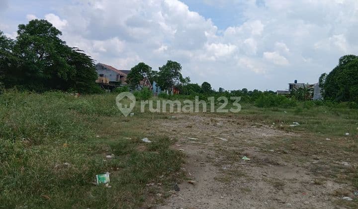Dijual lahan pinggir jalan raya cocok buat perumahan, pool mobil container, truk, Gudang, dll di Tarumajaya Bekasi