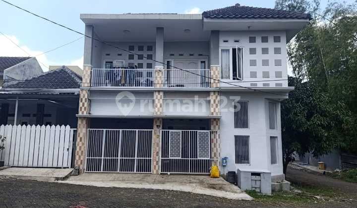 For Sale: 12-Room Boarding House Near Unibraw